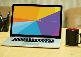 Free Photorealistic Device Mockup of Macbook Pro