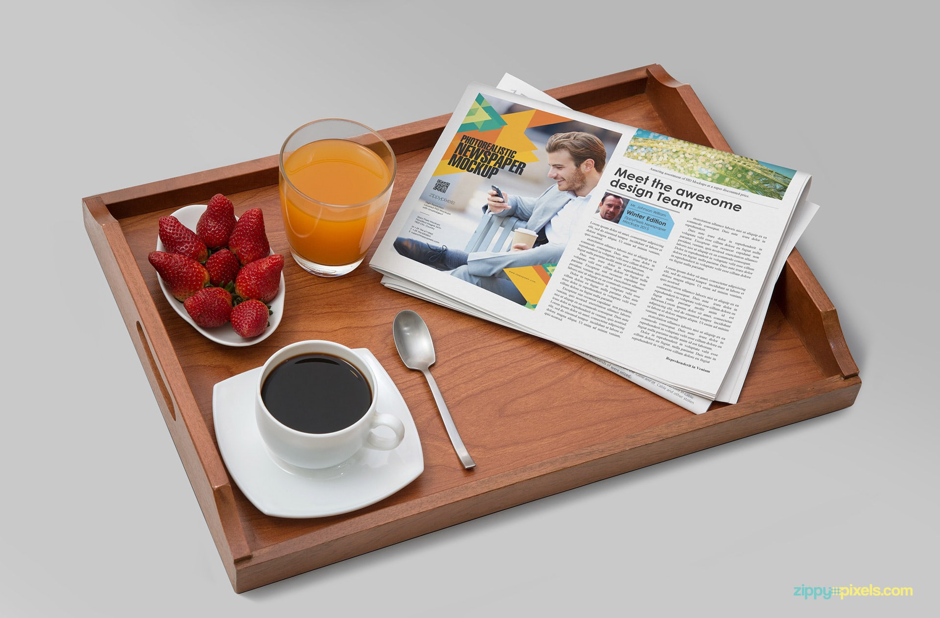 PSD mockup of newspaper showing quarter page ad in tray with coffee, juice & strawberry