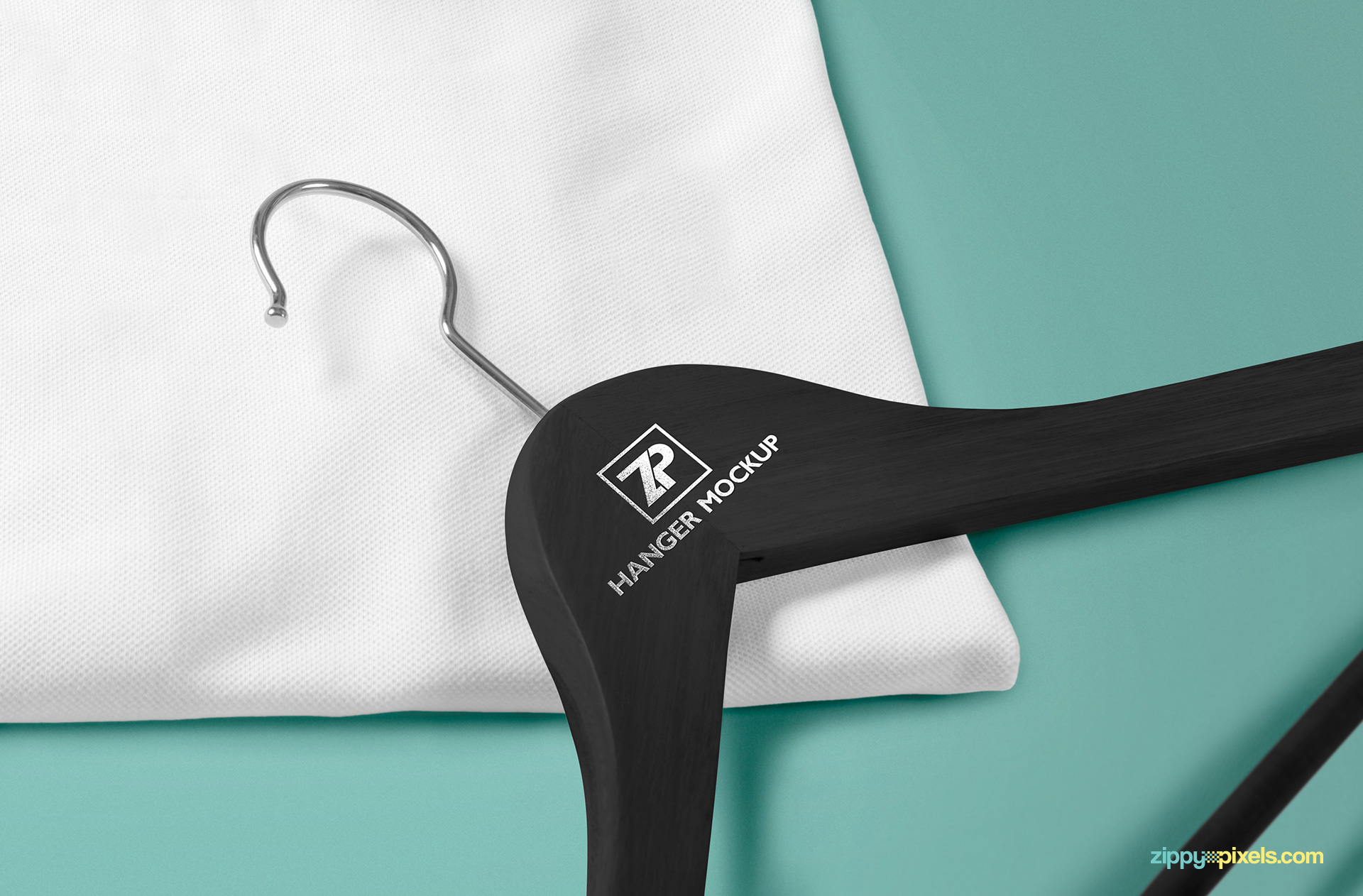 Free high-res hanger mockup psd to demonstrate your apparel brand designs.