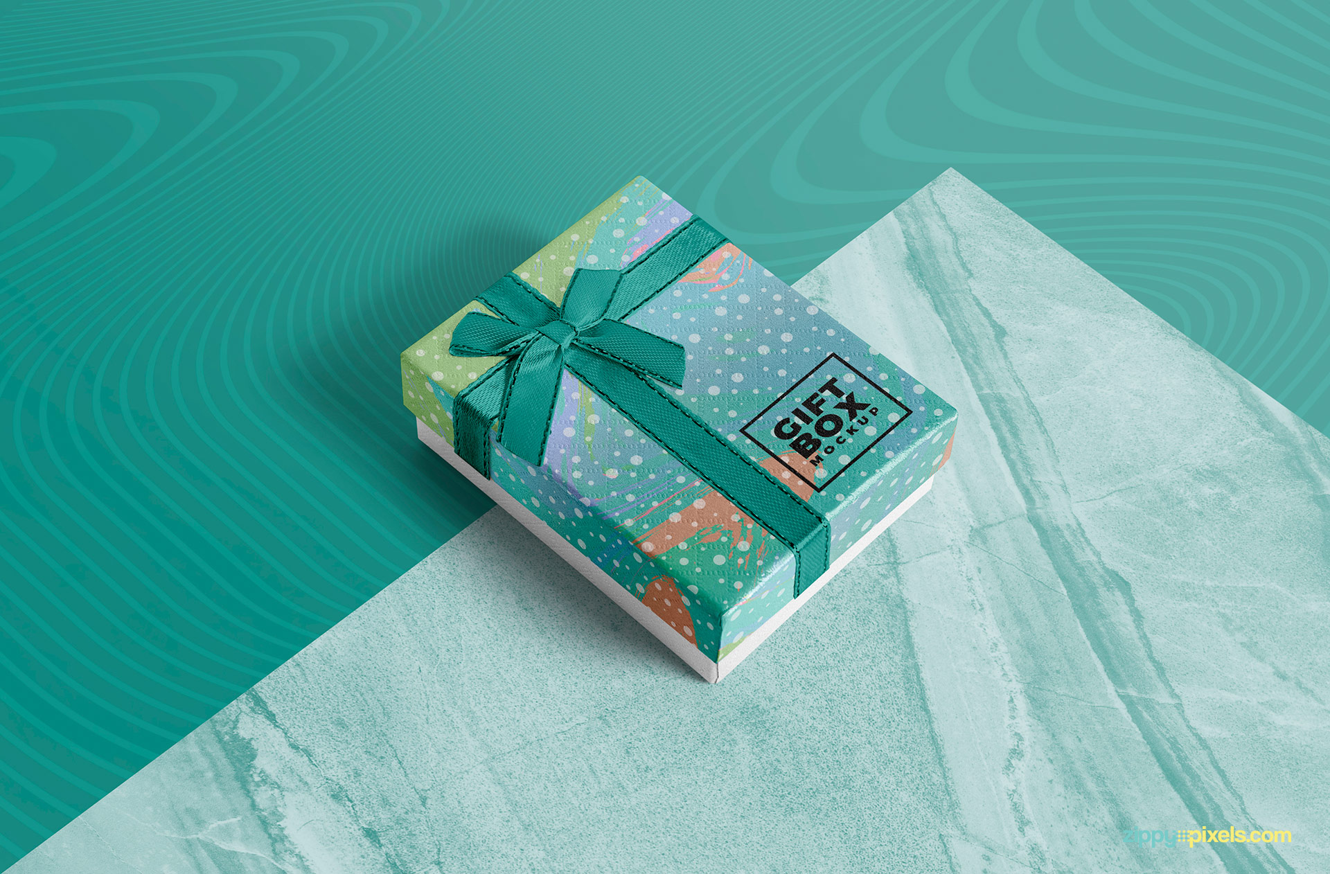 Free gift box mockup with a customizable marble base.