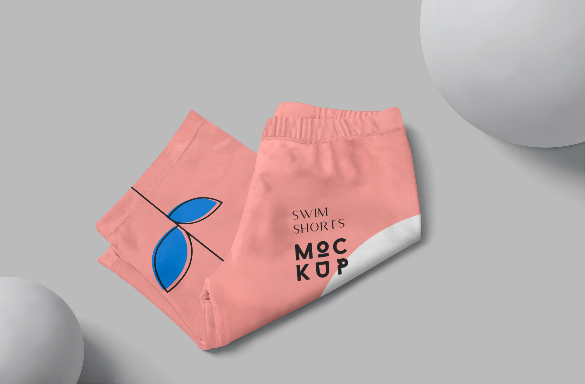 Folded Pink Swim Shorts Mockup for Sportswear