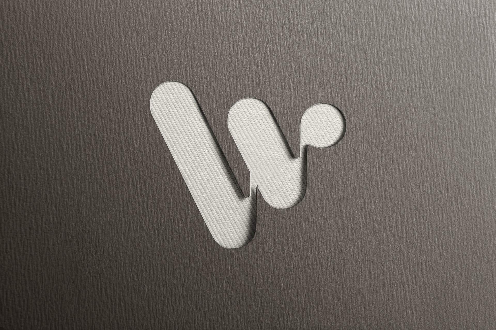 Embossed Cutout Logo Mockup on Dark Texture