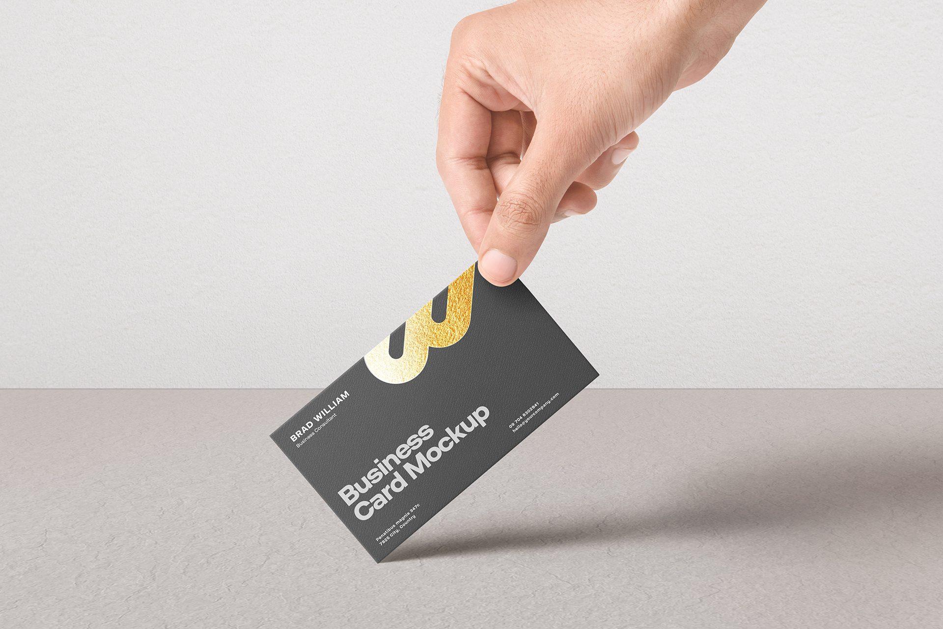 Hand Holding Business Card Mockup PSD