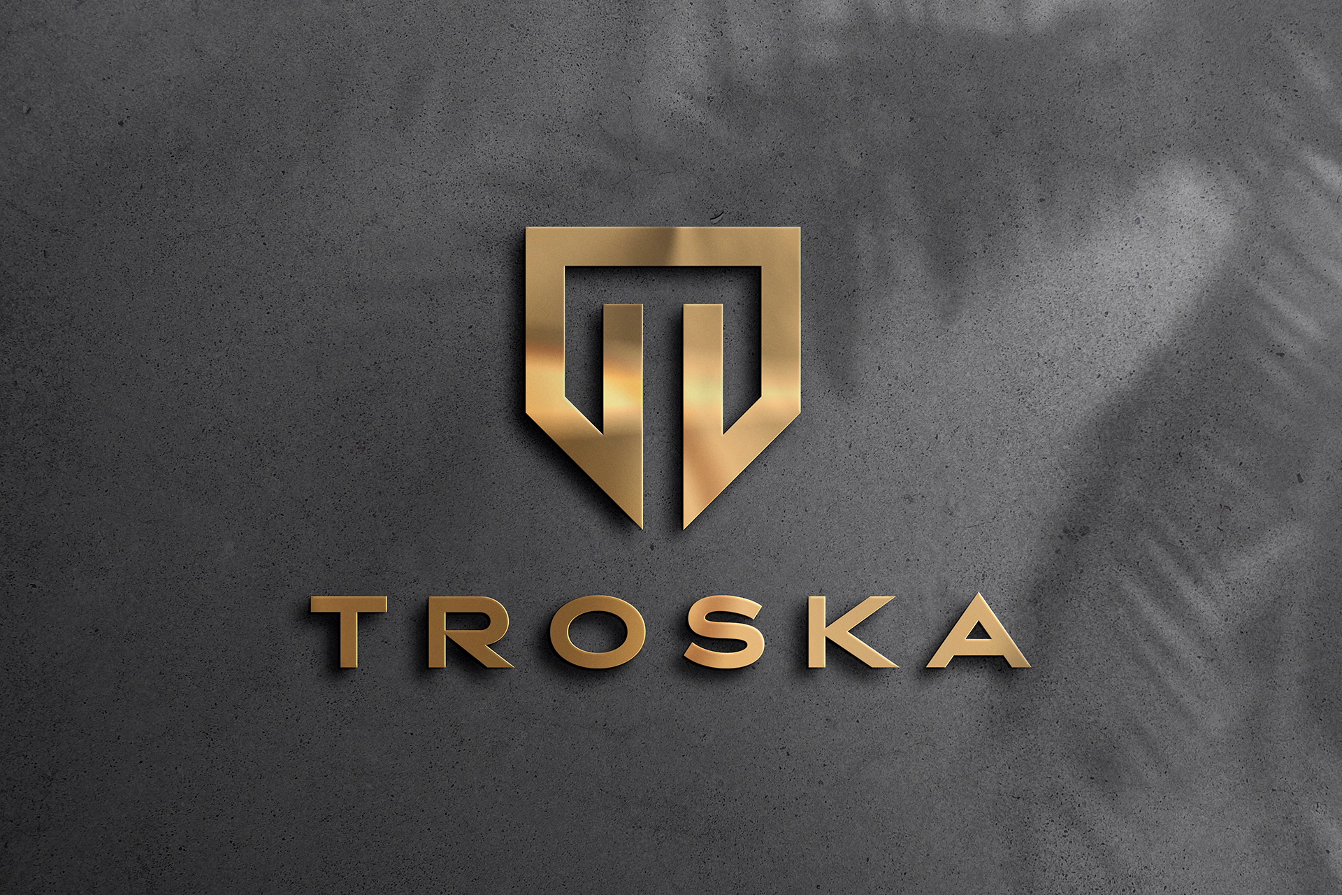 Gold Logo Mockup on Dark Concrete Surface