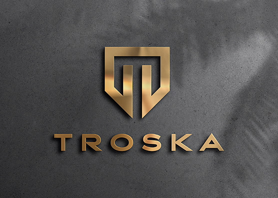 Gold Logo Mockup on Dark Concrete Surface