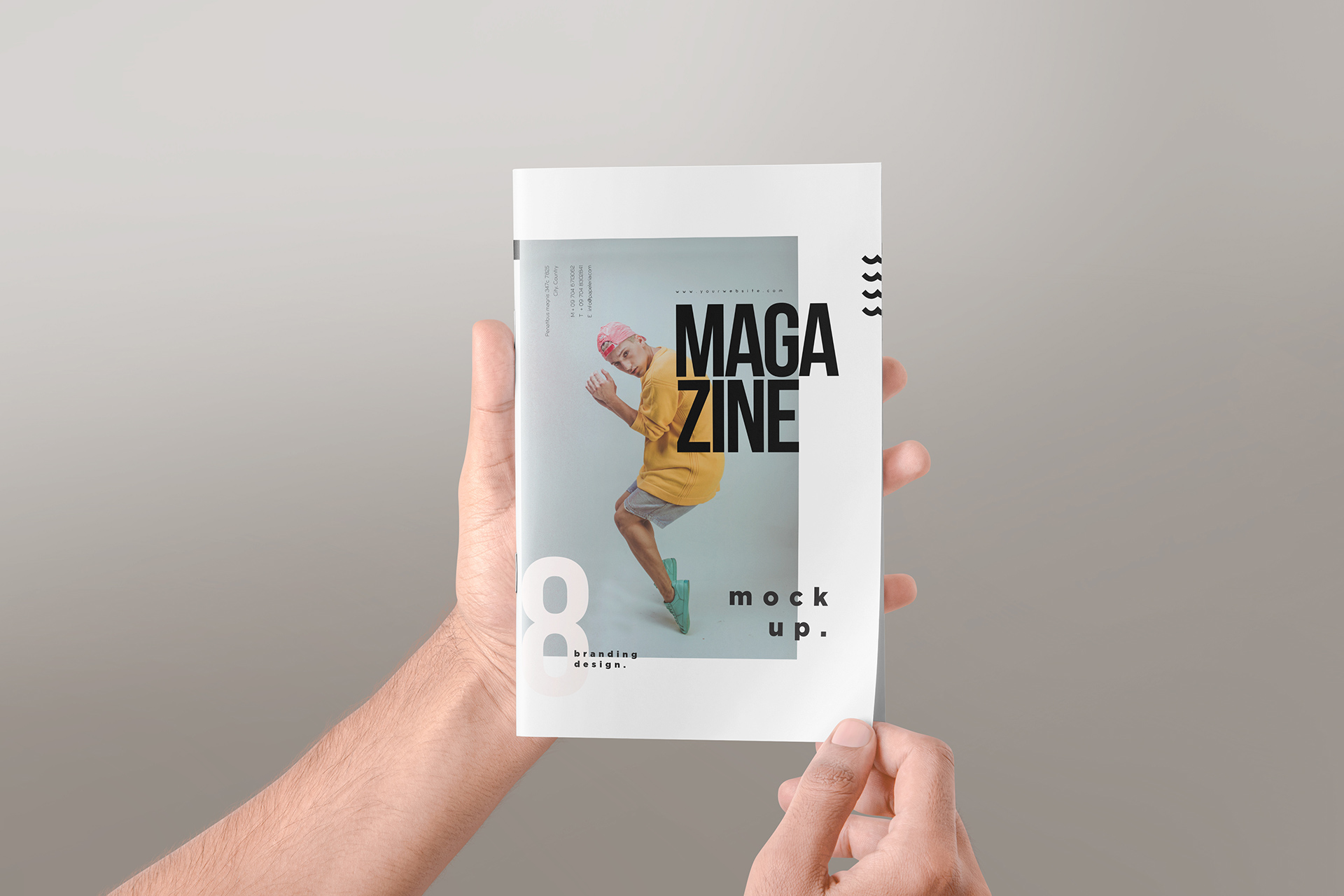Vertical Magazine Mockup in Hand View