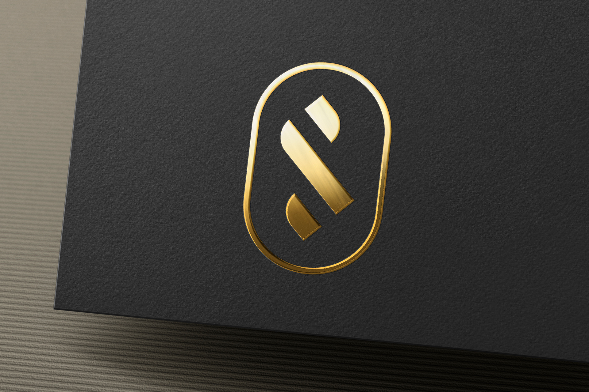 Gold Foil Logo Mockup on Black Card Texture