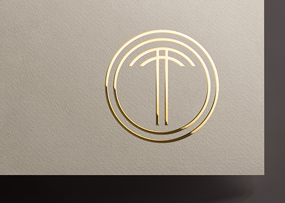 Minimalist Gold Foil Logo Mockup on Light Paper