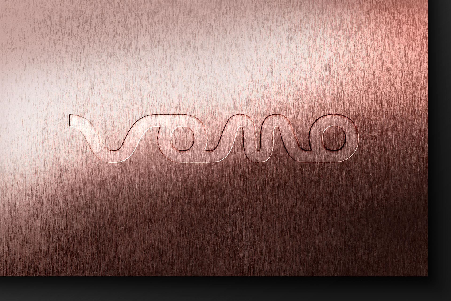 Debossed Logo Mockup on Rose Gold Metal