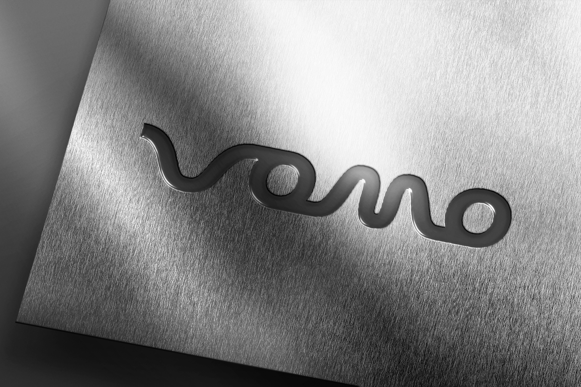 Debossed Logo Mockup on Brushed Silver Metal